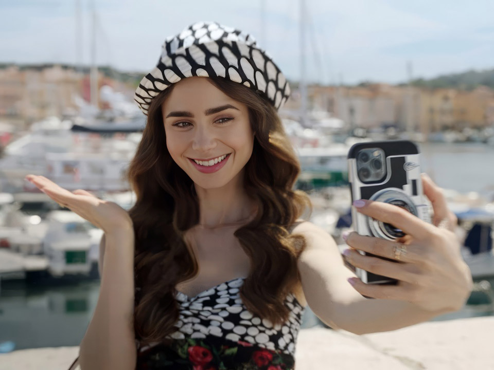 Selfie of Emily in Paris with hat